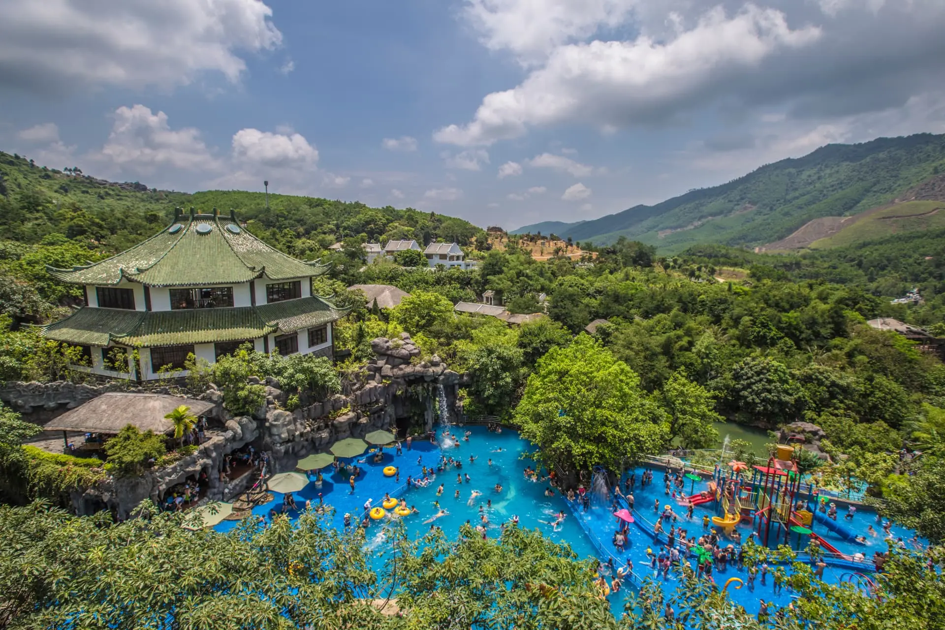 Mineral bathing pools within the green setting of Nui Than Tai Hot Springs Park